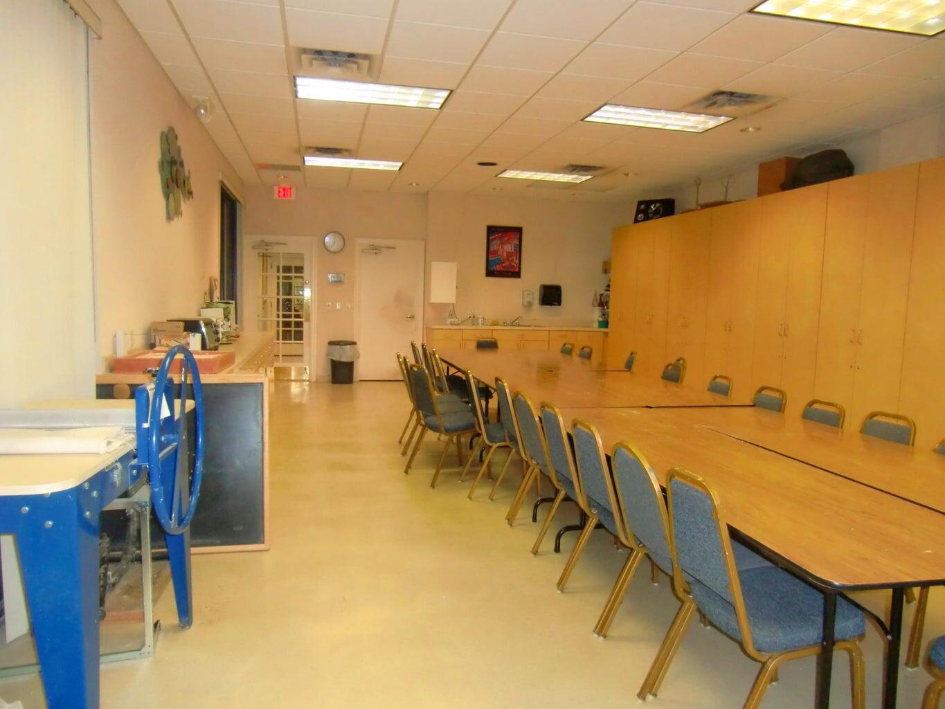 2686 Northwest 7th Court, Unit C Delray Beach, FL 33445 - Photo 22 of 33 a view of a dining room with furniture