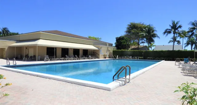 a view of a house with swimming pool