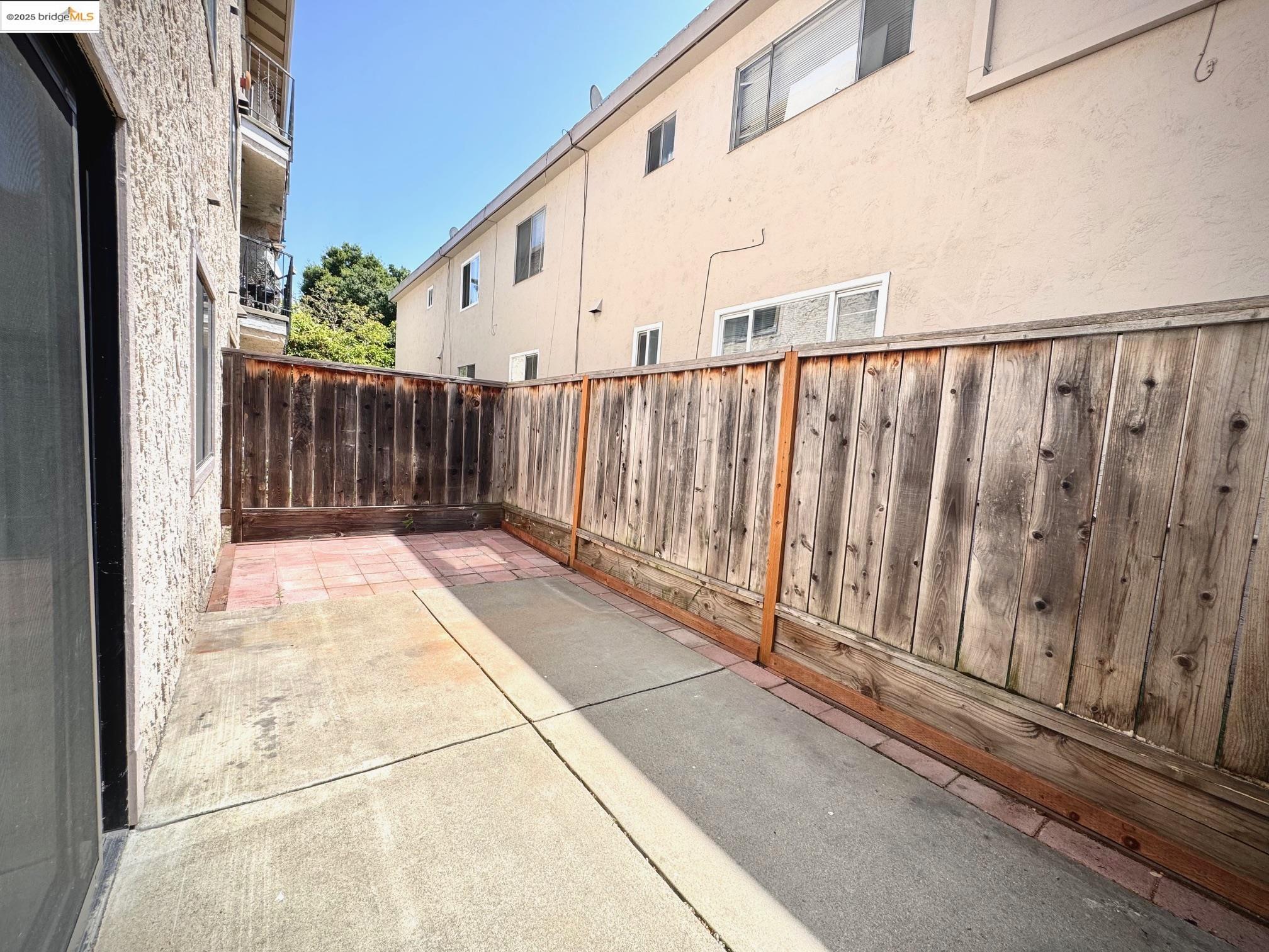 554 Bancroft Avenue, Unit 101 San Leandro, CA 94577 - Photo 16 of 17 a view of a balcony with wooden floor