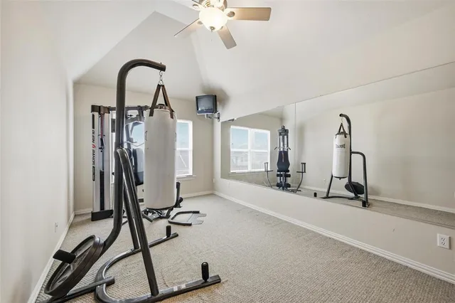 a view of a room with gym equipment