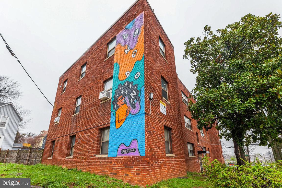 2100 Channing Street Northeast, Unit 2C Washington, DC 20018 - Photo 9 of 9 a view of a building with a tree