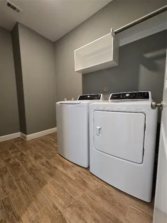 a room with dryer and washer