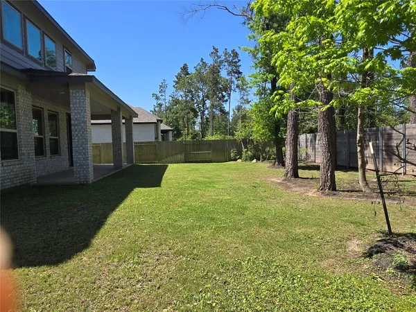 a view of a backyard with a garden