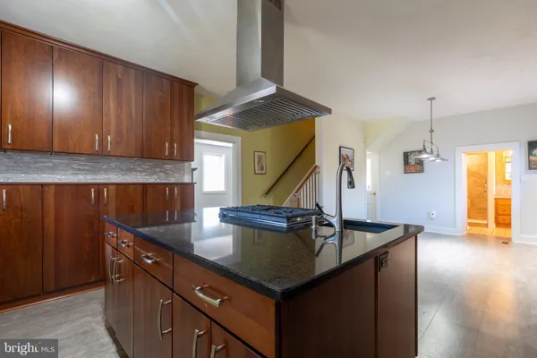 a bathroom with a sink and a shower