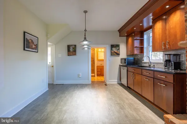 a view of front door with wooden floor