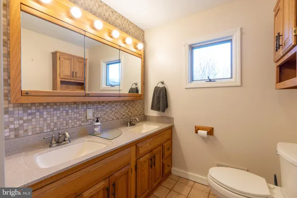 a view of front door with wooden floor