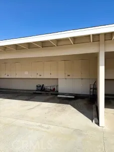a view of a swimming pool with a bench