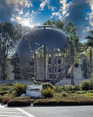 a view of kitchen with stove and cabinets