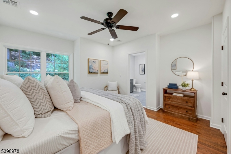 26 Woodland Road Morristown, NJ 07960 - Photo 15 of 26 a bed room with a bed and a dresser