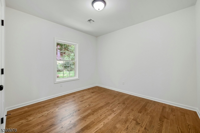 26 Woodland Road Morristown, NJ 07960 - Photo 18 of 26 an empty room with a window