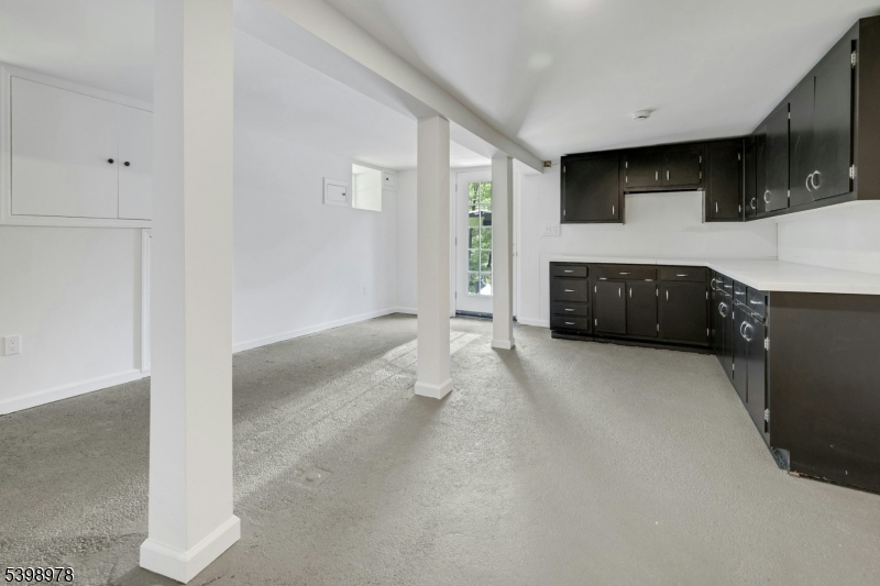 26 Woodland Road Morristown, NJ 07960 - Photo 24 of 26 a view of a kitchen with furniture and wooden floor