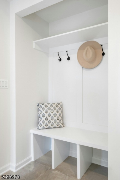 26 Woodland Road Morristown, NJ 07960 - Photo 26 of 26 a living room with table and chairs