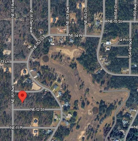 a view of a gate and a window