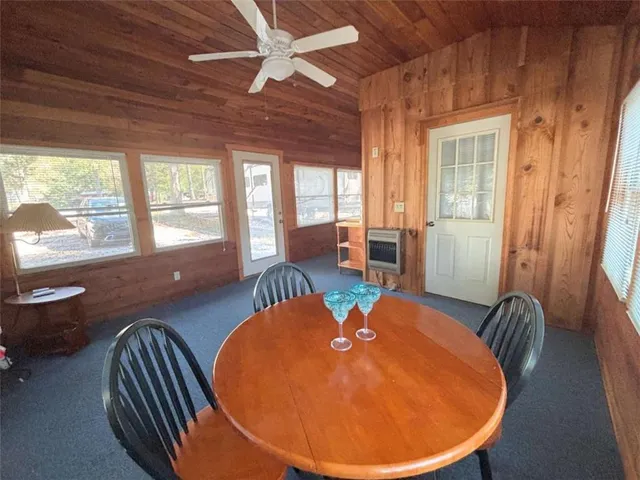 a view of a livingroom with furniture window and outside view
