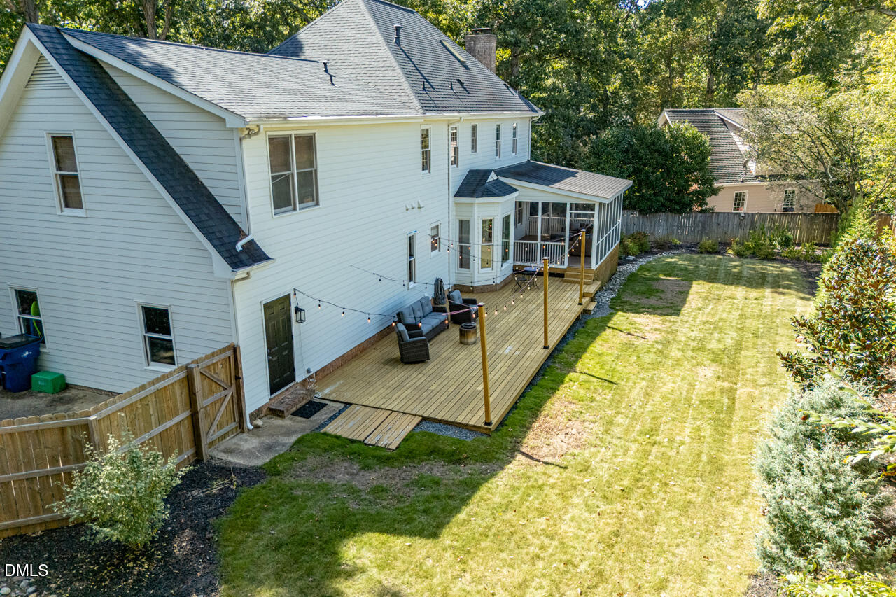 8713 Mourning Dove Road Raleigh, NC 27615 - Photo 46 of 56 a view of house with swimming pool