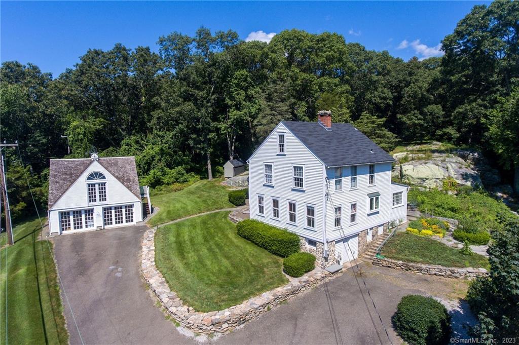 107 Signal Hill Road Madison, CT 06443 - Photo 1 of 1 an aerial view of a house with yard and green space