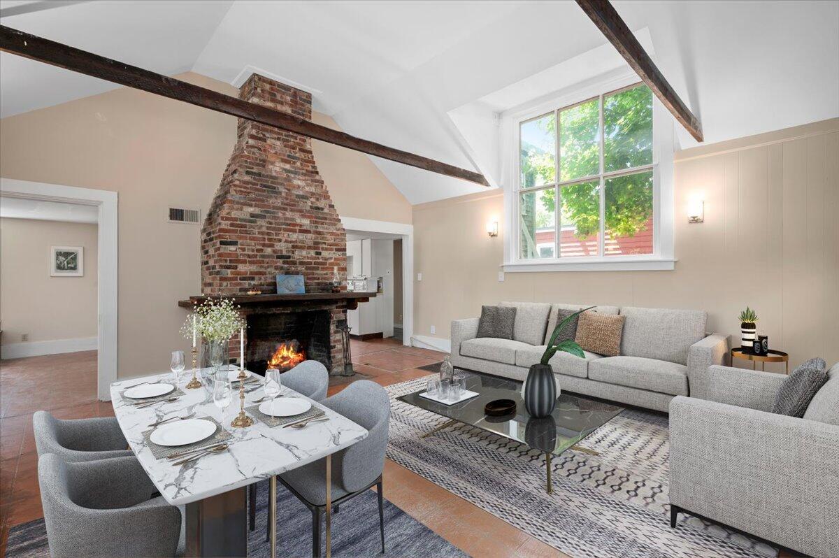 6 Priscilla Alden Road Provincetown, MA 02657 - Photo 15 of 58 a living room with furniture and a fireplace