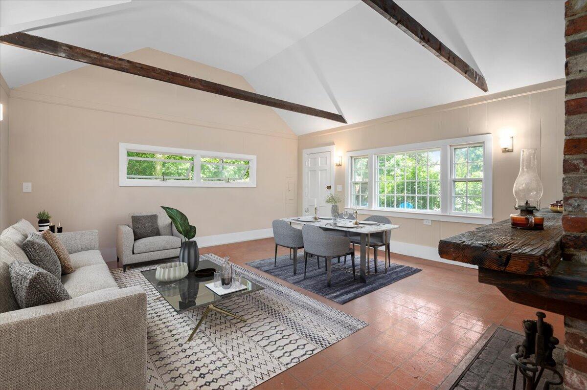 6 Priscilla Alden Road Provincetown, MA 02657 - Photo 17 of 58 a living room with furniture and a large window
