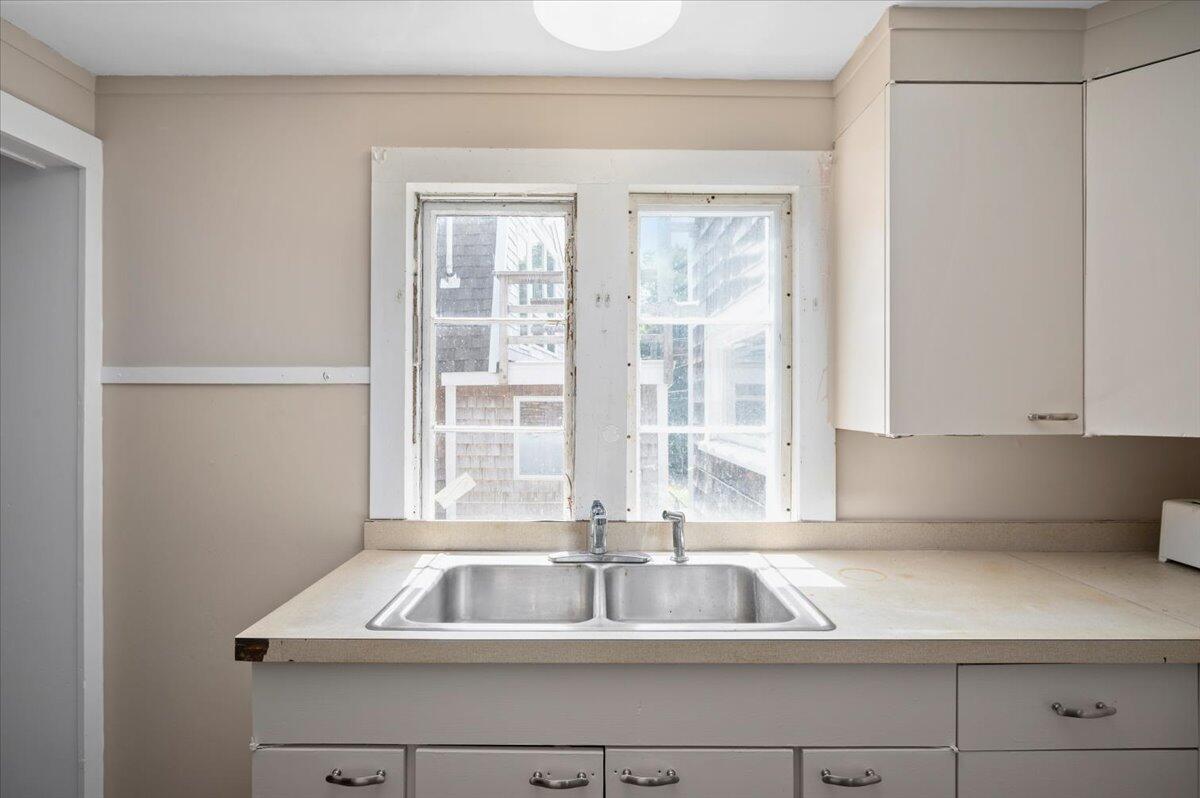 6 Priscilla Alden Road Provincetown, MA 02657 - Photo 29 of 58 a kitchen with a sink and a window