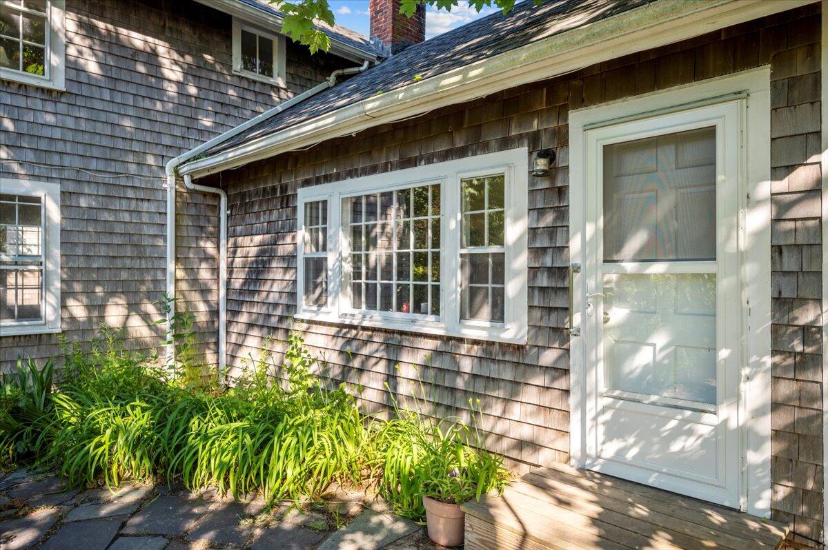 6 Priscilla Alden Road Provincetown, MA 02657 - Photo 3 of 58 a front view of a house with a yard