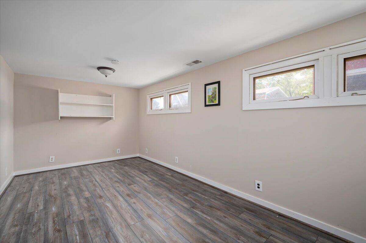 6 Priscilla Alden Road Provincetown, MA 02657 - Photo 37 of 58 wooden floor in an empty room with a window
