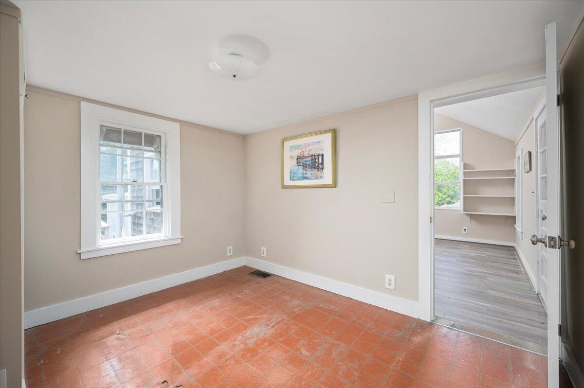 6 Priscilla Alden Road Provincetown, MA 02657 - Photo 39 of 58 wooden floor in an empty room with a window