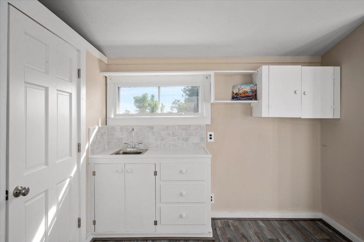6 Priscilla Alden Road Provincetown, MA 02657 - Photo 46 of 58 a room with a sink and cabinets