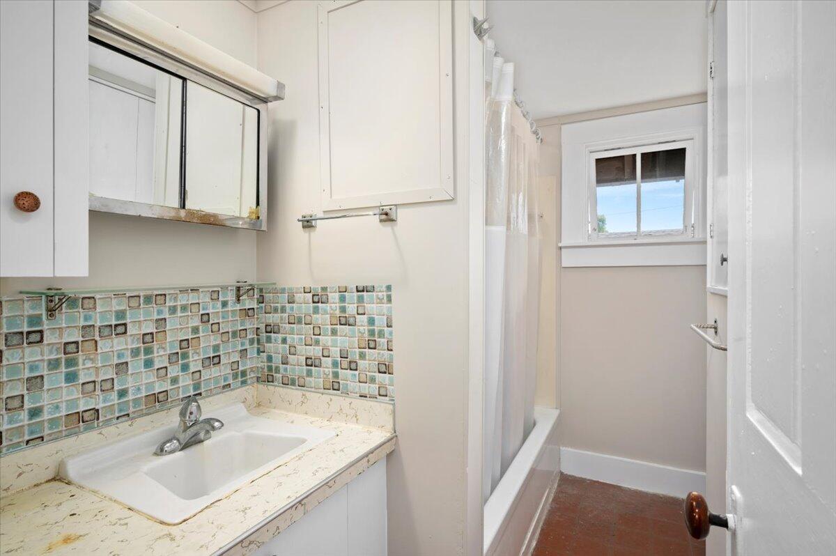 6 Priscilla Alden Road Provincetown, MA 02657 - Photo 51 of 58 a bathroom with a sink and a mirror