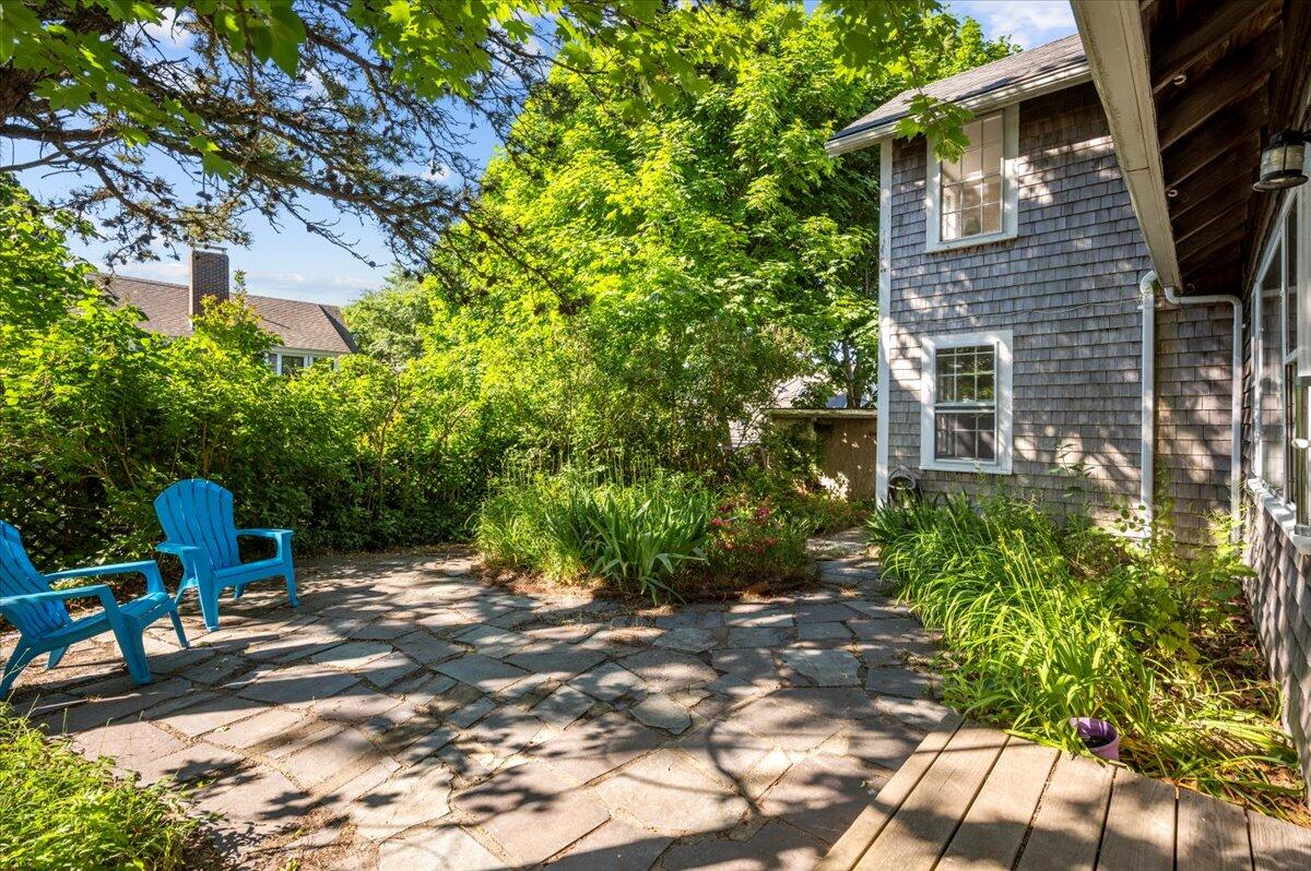 6 Priscilla Alden Road Provincetown, MA 02657 - Photo 6 of 58 a view of backyard with outdoor seating and trees