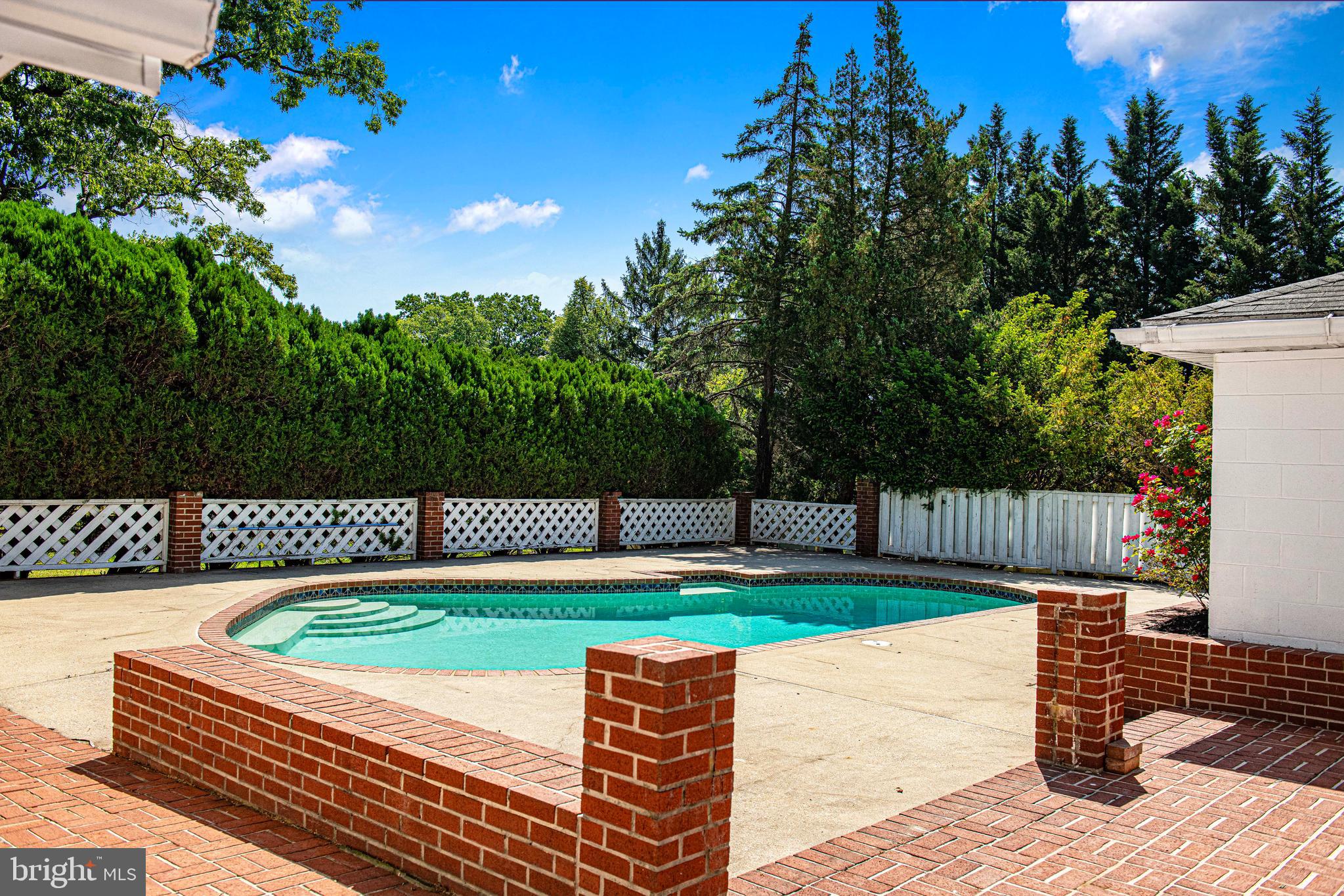8724 Littlewood Road Baltimore, MD 21234 - Photo 22 of 30 Plenty of room for lounging and dining poolside