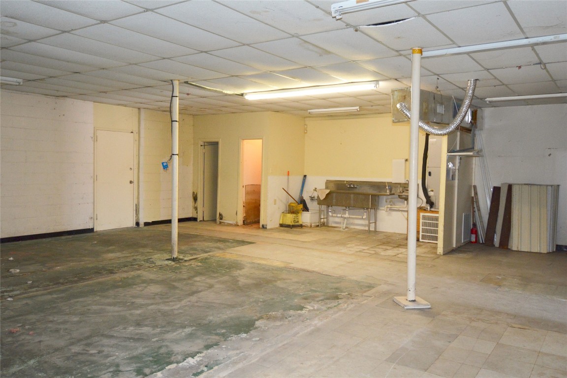 10013 West Montgomery Road Houston, TX 77088 - Photo 4 of 6 a view of a room with wooden walls
