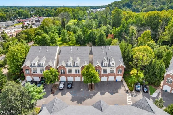 an aerial view of a house with garden space and outdoor space
