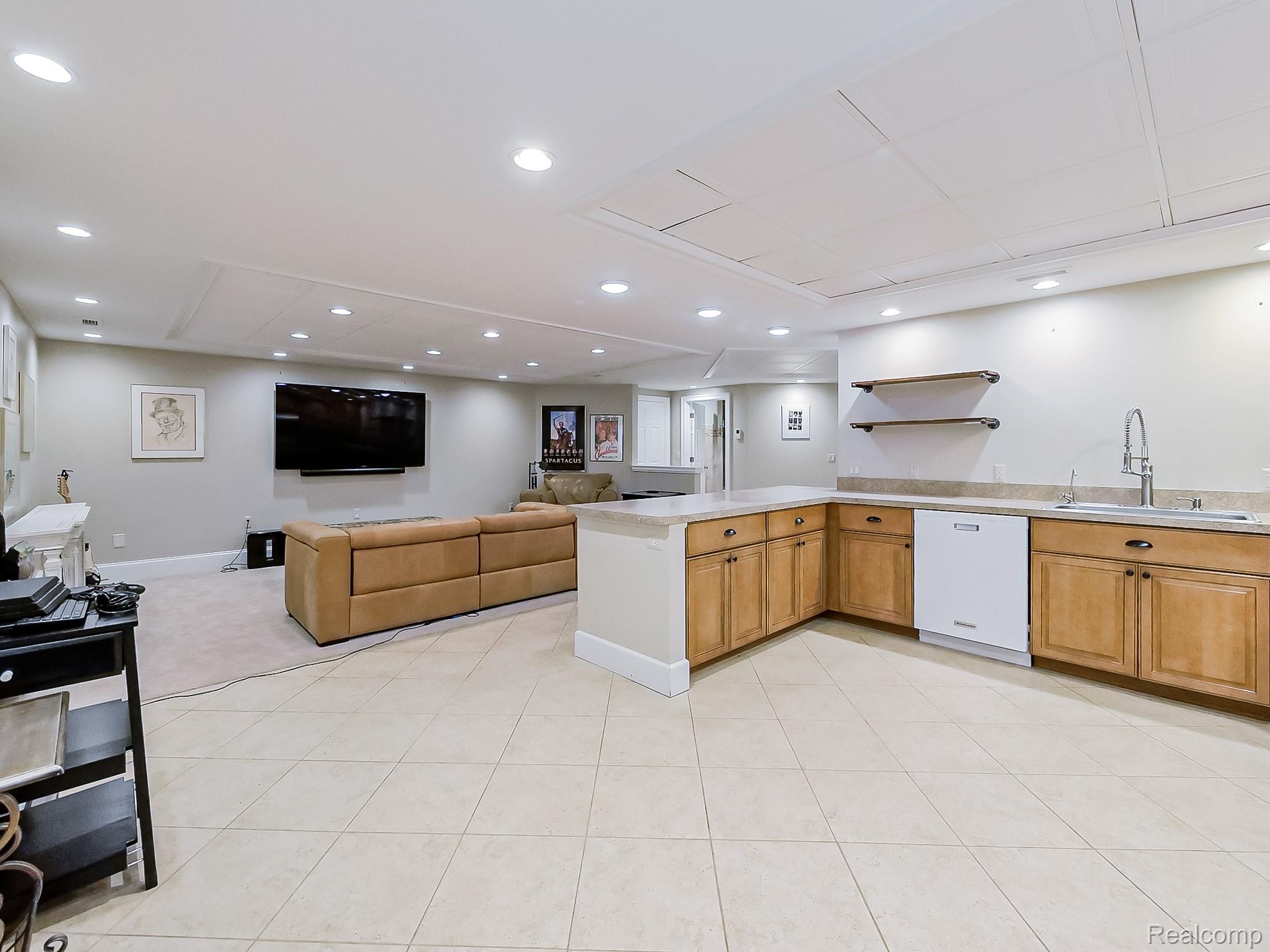 3720 East Clarkston Road Oakland, MI 48363 - Photo 58 of 60 Kitchen featuring open floor plan, a peninsula, white dishwasher, wood finish cabinets, and recessed lighting