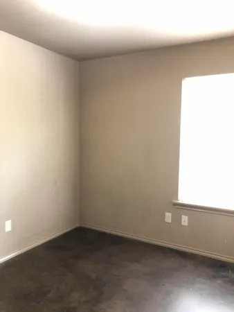 an empty room with a window