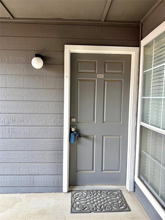 18333 Roehampton Drive, Unit 624 Dallas, TX 75252 - Photo 3 of 39 a view of front door of a house