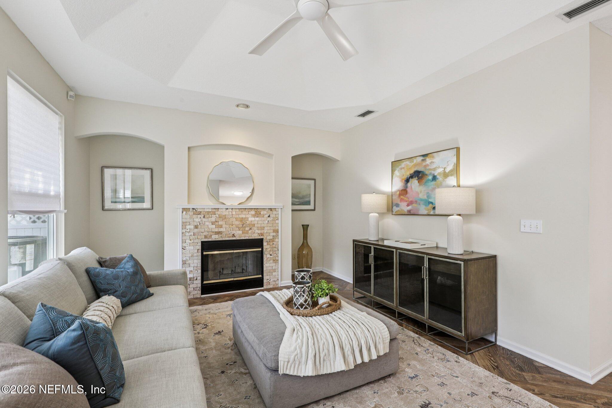 1001 Andrea Way St. Johns, FL 32259 - Photo 12 of 61 a living room with furniture and a fireplace