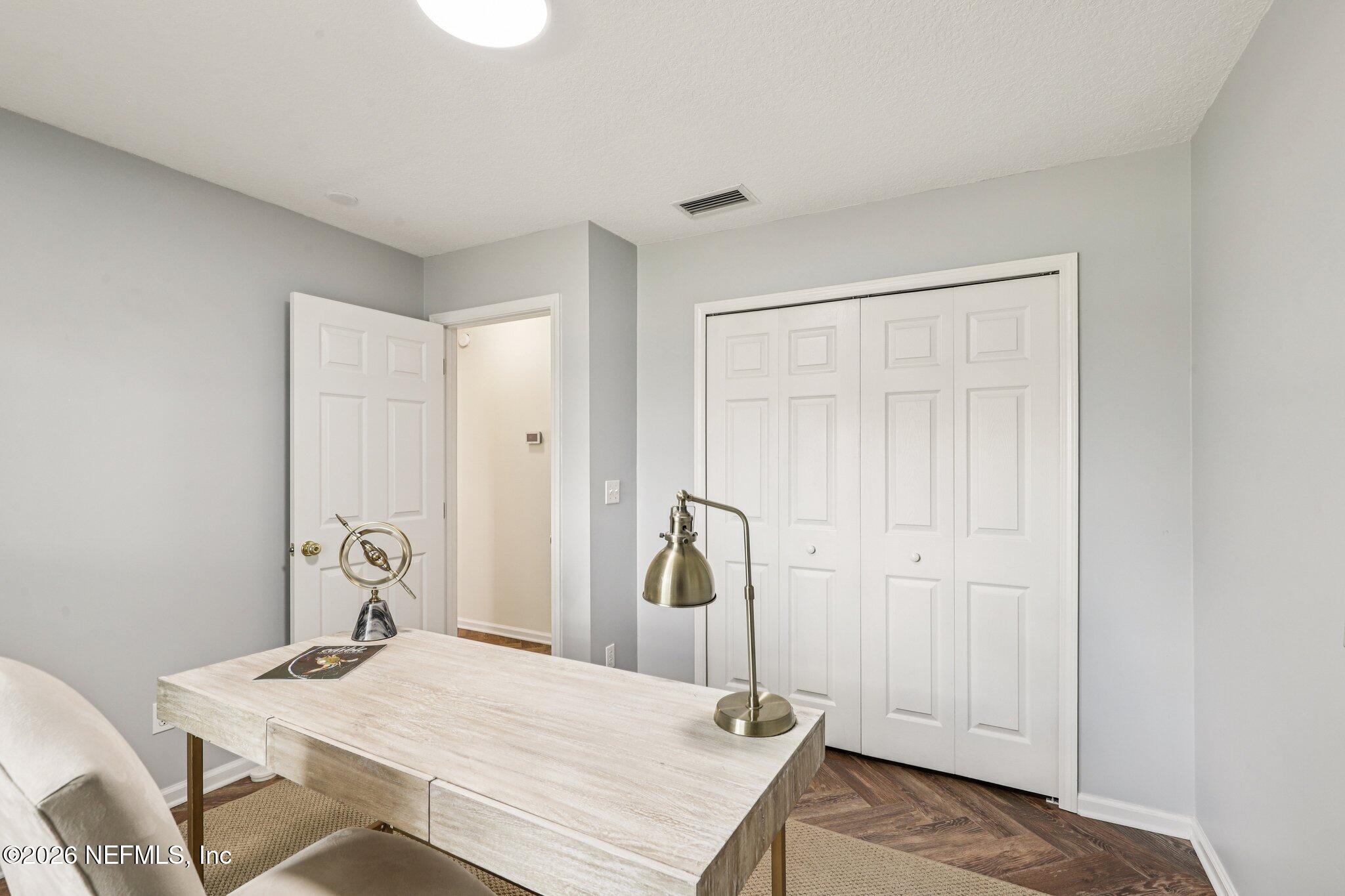 1001 Andrea Way St. Johns, FL 32259 - Photo 19 of 61 a room that has a bed and a table in it