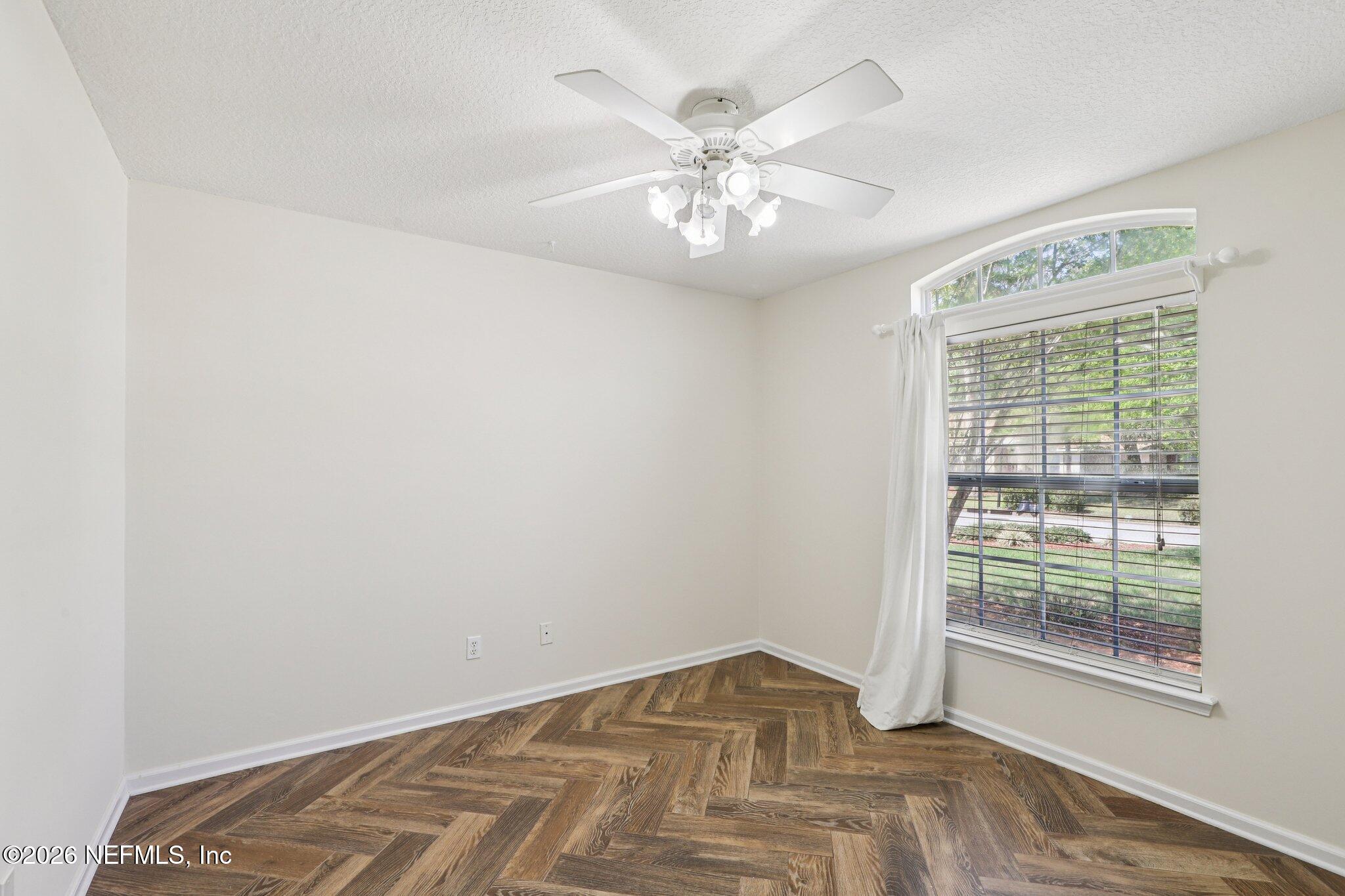 1001 Andrea Way St. Johns, FL 32259 - Photo 20 of 61 a view of an empty room with wooden floor and a window