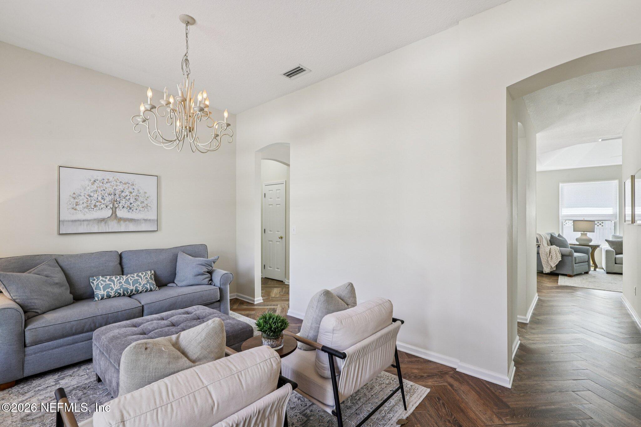 1001 Andrea Way St. Johns, FL 32259 - Photo 22 of 61 a living room with furniture a couch and wooden floor