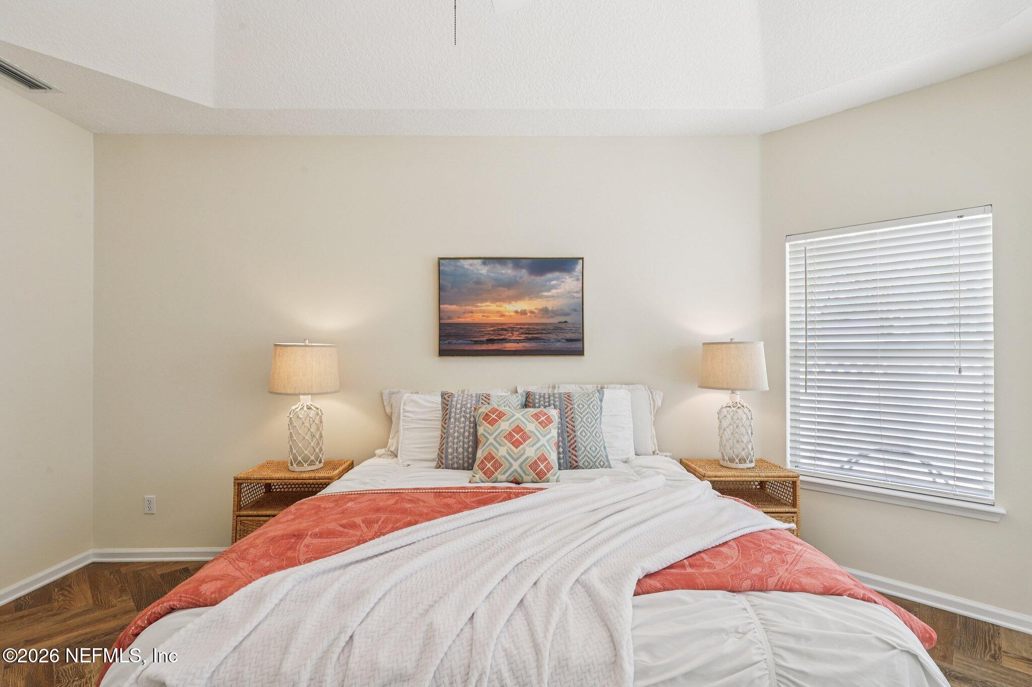 1001 Andrea Way St. Johns, FL 32259 - Photo 27 of 61 a bedroom with a bed and a lamp