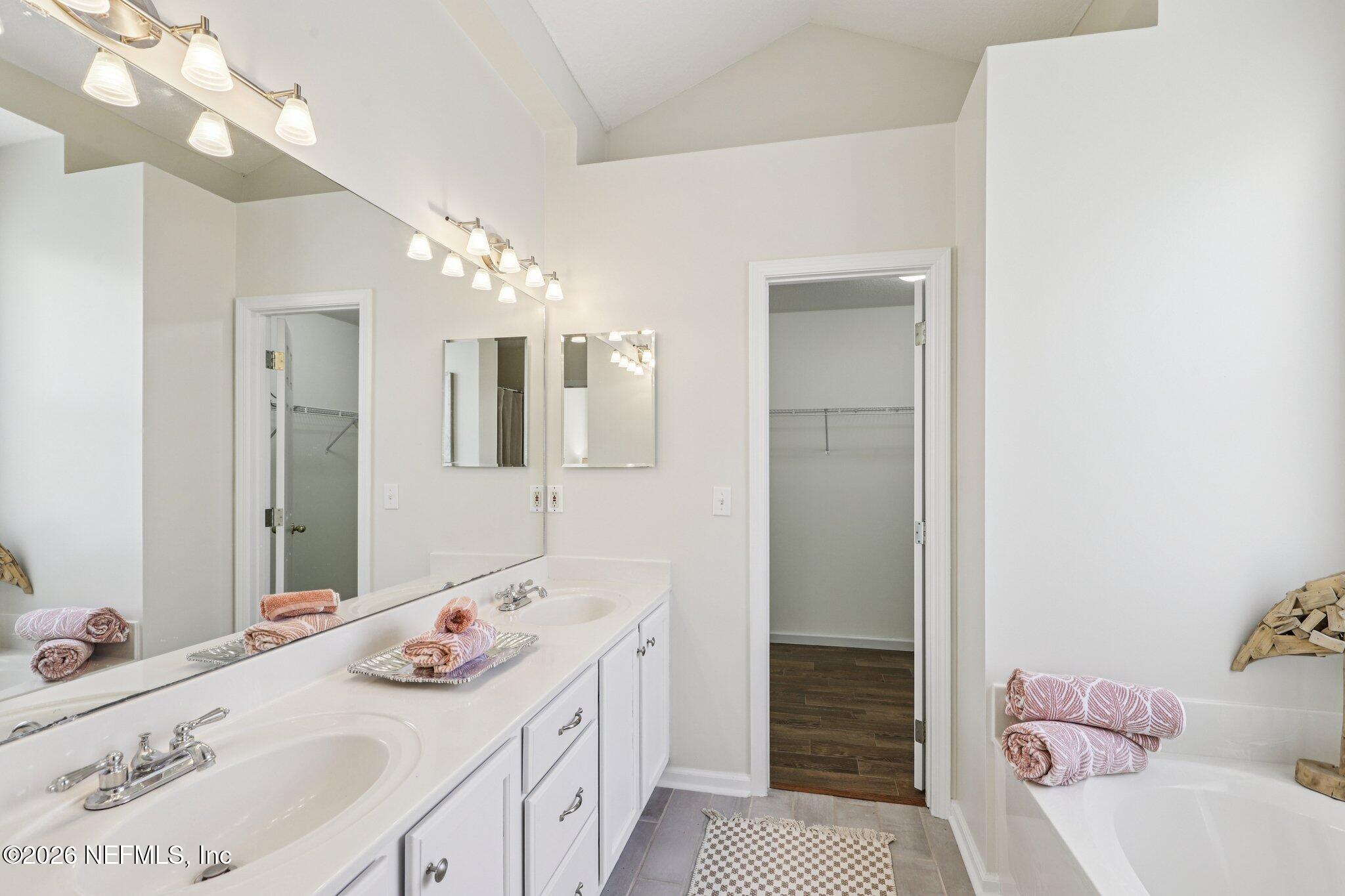 1001 Andrea Way St. Johns, FL 32259 - Photo 33 of 61 a bathroom with a sink a vanity and a mirror