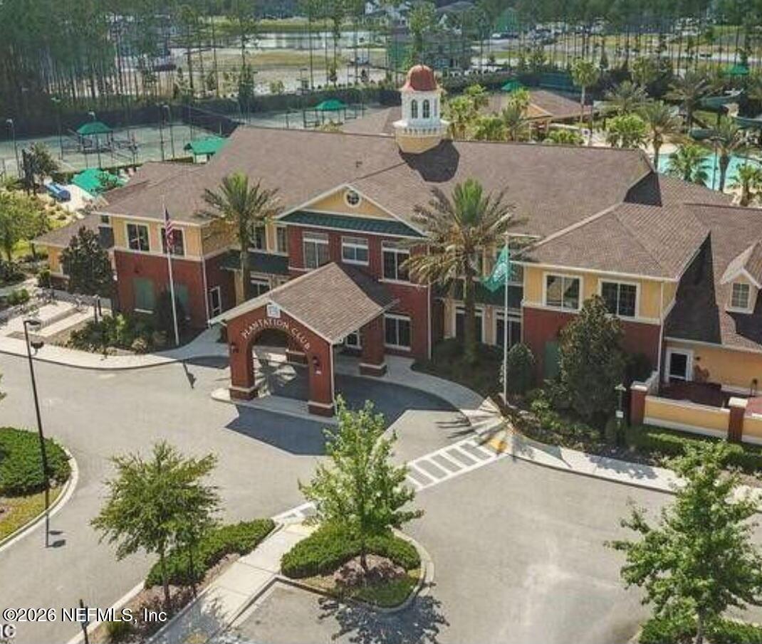 1001 Andrea Way St. Johns, FL 32259 - Photo 47 of 61 an aerial view of a house with a yard patio and lake view