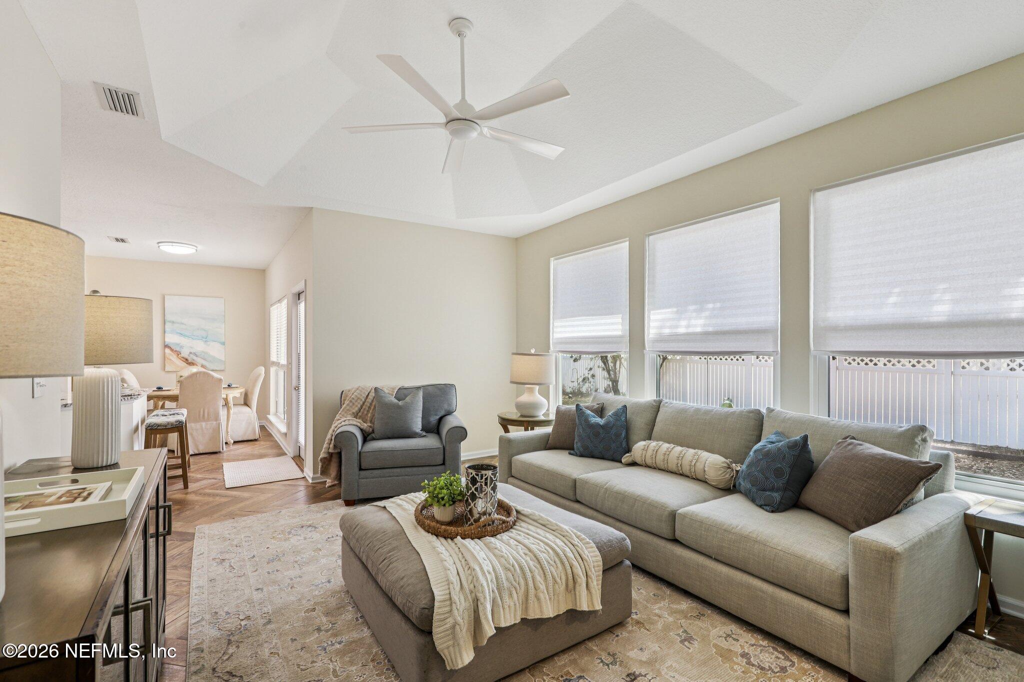 1001 Andrea Way St. Johns, FL 32259 - Photo 10 of 61 a living room with furniture and a large window