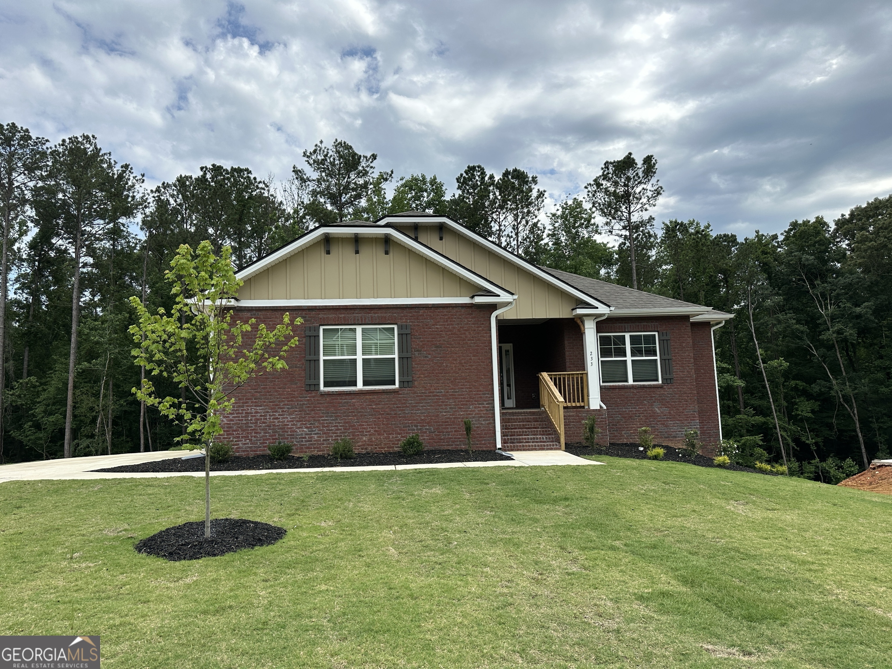 233 Carsons Walk Macon, GA 31206 - Photo 1 of 15 a backyard of a house with lots of green space