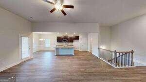 233 Carsons Walk Macon, GA 31206 - Photo 6 of 15 a view of dining room with wooden floor
