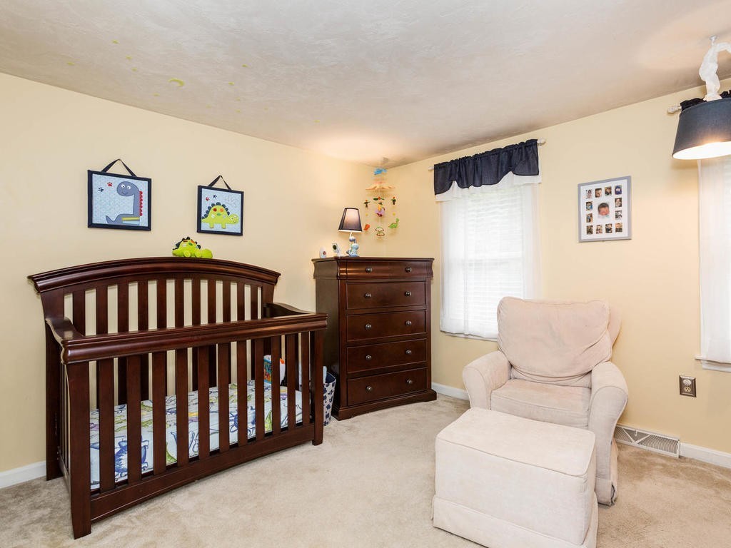 11 Rivers Edge Drive Rowley, MA 01969 - Photo 19 of 24 a bedroom with furniture and wooden floor