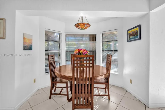 a view of a dining room with furniture