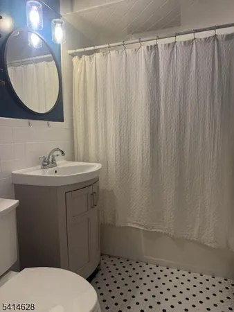 a view of street with parked cars