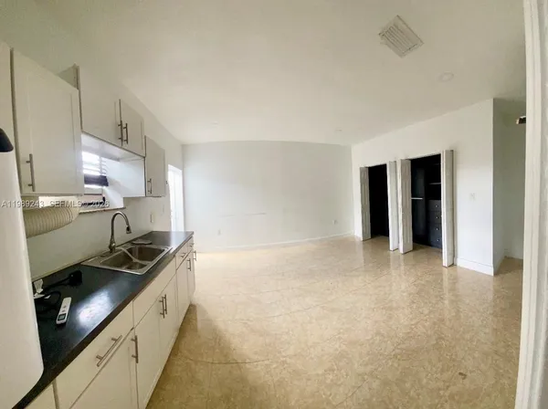 a kitchen that has a sink