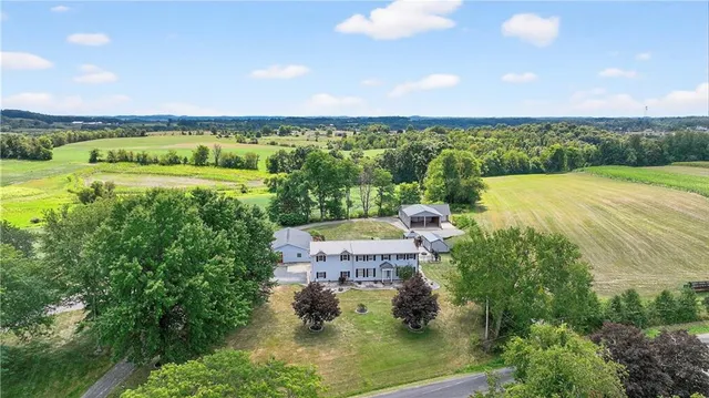 an aerial view of a house with a garden